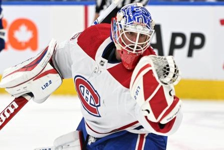 Sep 28, 2022; Toronto, Ontario, CAN; Montreal Canadiens goalie Samuel Montembeault (35) makes a glove save against the Toronto Maple Leafs in the second period at Scotiabank Arena.