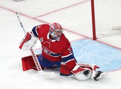 Jul 2, 2021; Montreal, Quebec, CAN; Montreal Canadiens goaltender Carey Price (31) makes a glove save against the Tampa Bay Lightning during the third period in game three of the 2021 Stanley Cup Final at Bell Centre. Mandatory Credit: Jean-Yves Ahern-Imagn Images