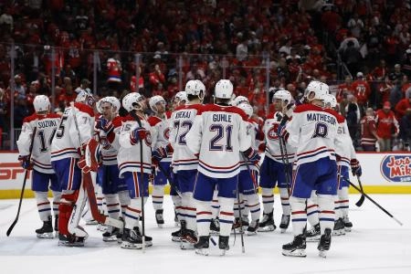 Apr 30, 2025; Washington, District of Columbia, USA; Montreal Canadiens players wait to go through the handshake line after game five of the first round of the 2025 Stanley Cup Playoffs against the Washington Capitals at Capital One Arena. Mandatory Credit: Geoff Burke-Imagn Images