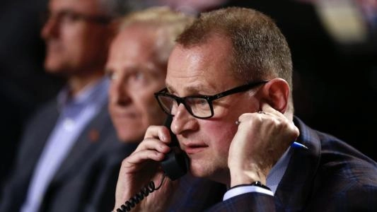 Maple Leafs GM Brad Treliving on the phone during the NHL Draft. Maple Leafs GM Brad Treliving on the phone during the NHL Draft.
