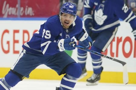 Mar 19, 2025; Toronto, Ontario, CAN; Toronto Maple Leafs forward Nicholas Robertson (89) skates against the Colorado Avalanche during the second period at Scotiabank Arena. Mandatory Credit: John E. Sokolowski-Imagn Images
