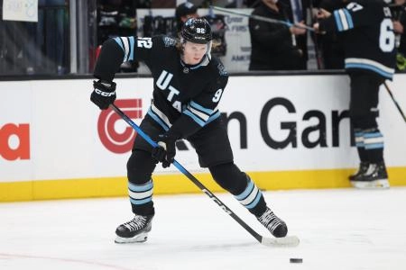 Apr 8, 2025; Salt Lake City, Utah, USA; Utah Hockey Club center Logan Cooley (92) warms up before a game against the Seattle Kraken at Delta Center. Mandatory Credit: Rob Gray-Imagn Images