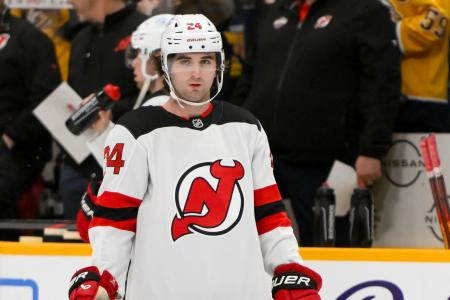 Feb 23, 2025; Nashville, Tennessee, USA; New Jersey Devils right wing Nathan Bastian (14) warms up before a game at Bridgestone Arena. Mandatory Credit: Steve Roberts-Imagn Images