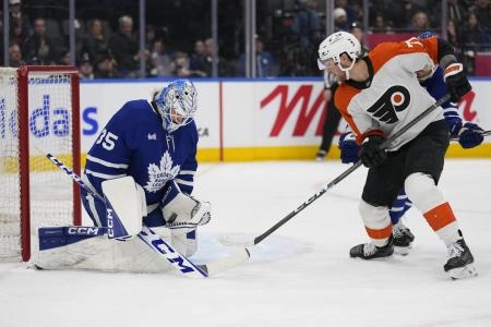 Toronto Maple Leafs goaltender Dennis Hildeby making a save against the Philadelphia Flyers. Toronto Maple Leafs goaltender Dennis Hildeby making a save against the Philadelphia Flyers.
