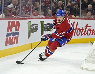 Jan 6, 2025; Montreal, Quebec, CAN; Montreal Canadiens defenseman Arber Xhekaj (72) plays the puck during the third period of the game against the Vancouver Canucks at the Bell Centre. Mandatory Credit: Eric Bolte-Imagn Images