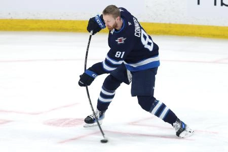 May 9, 2025; Winnipeg, Manitoba, CAN;Winnipeg Jets left wing Kyle Connor (81) warms up before a game against the Dallas Stars in game two of the second round of the 2025 Stanley Cup Playoffs at Canada Life Centre. Mandatory Credit: James Carey Lauder-Imagn Images