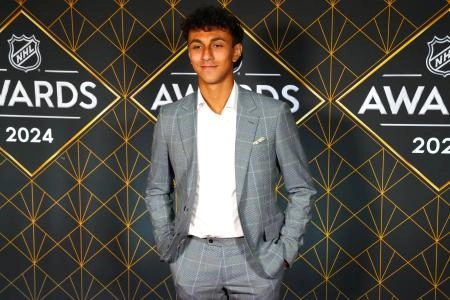 Jun 27, 2024; Las Vegas, Nevada, USA; Michael Hage appears on a red carpet before the start of the 2024 NHL Awards at Fontainebleau Las Vegas. Mandatory Credit: Stephen R. Sylvanie-Imagn Images