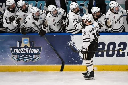 Apr 12, 2025; St. Louis, Missouri, UNITED STATES; Western Michigan Broncos forward Wyatt Schingoethe (18) celebrates with teammates after scoring a goal against the Boston University Terriers during the first period of the Frozen Four college ice hockey national championship at Enterprise Center Apr 12, 2025; St. Louis, Missouri, UNITED STATES; Western Michigan Broncos forward Wyatt Schingoethe (18) celebrates with teammates after scoring a goal against the Boston University Terriers during the first period of the Frozen Four college ice hockey national championship at Enterprise Center