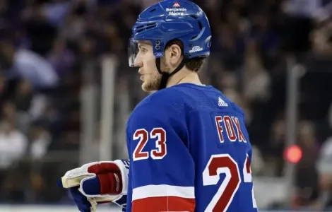 New York Rangers' Adam Fox during a hockey game New York Rangers' Adam Fox during a hockey game