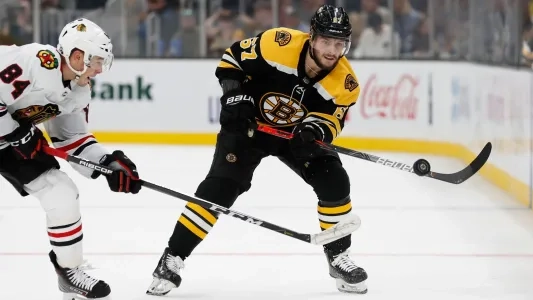 Boston Bruins' Jakub Zboril skates with the puck vs. the Chicago Blackhawks Boston Bruins' Jakub Zboril skates with the puck vs. the Chicago Blackhawks