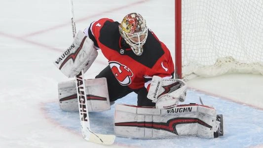New Jersey Devils' Keith Kinkaid makes a save during a hockey game