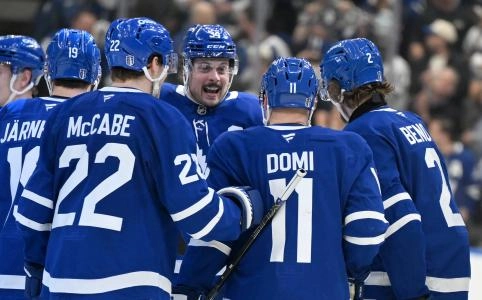 Apr 22, 2025; Toronto, Ontario, CAN; Toronto Maple Leafs forward Auston Matthews (34) greets forward Tie Domi (11) as they celebrate an overtime win over the Ottawa Senators in game two of the first round of the 2025 Stanley Cup Playoffs at Scotiabank Arena. Mandatory Credit: Dan Hamilton-Imagn Images Apr 22, 2025; Toronto, Ontario, CAN; Toronto Maple Leafs forward Auston Matthews (34) greets forward Tie Domi (11) as they celebrate an overtime win over the Ottawa Senators in game two of the first round of the 2025 Stanley Cup Playoffs at Scotiabank Arena. Mandatory Credit: Dan Hamilton-Imagn Images