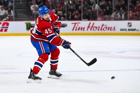 Apr 16, 2025; Montreal, Quebec, CAN; Montreal Canadiens defenseman Alexandre Carrier (45) shoots the puck against the Carolina Hurricanes in the first period at Bell Centre. Mandatory Credit: David Kirouac-Imagn Images Apr 16, 2025; Montreal, Quebec, CAN; Montreal Canadiens defenseman Alexandre Carrier (45) shoots the puck against the Carolina Hurricanes in the first period at Bell Centre. Mandatory Credit: David Kirouac-Imagn Images