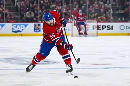 Apr 27, 2025; Montreal, Quebec, CAN; Montreal Canadiens defenseman David Savard (58) shoots the puck against the Washington Capitals during the first period in game four of the first round of the 2025 Stanley Cup Playoffs at Bell Centre. Mandatory Credit: David Kirouac-Imagn Images