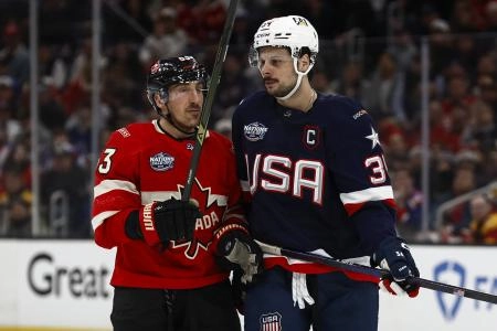 Team Canada forward Brad Marchand and United States forward Auston Matthews during the 4 Nations Face-Off