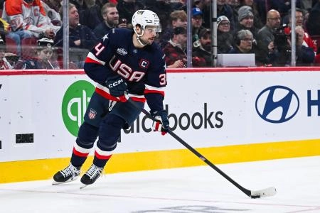 Feb 13, 2025; Montreal, Quebec, CAN; [Imagn Images direct customers only] Team USA forward Auston Matthews (34) plays the puck against Team Finland in the second period during a 4 Nations Face-Off ice hockey game at Bell Centre. Mandatory Credit: David Kirouac-Imagn Images