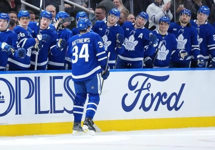 Apr 17, 2025; Toronto, Ontario, CAN; Toronto Maple Leafs center Auston Matthews (34) celebrates at the bench after scoring a goal against the Detroit Red Wings during the first period at Scotiabank Arena. Mandatory Credit: Nick Turchiaro-Imagn Images Apr 17, 2025; Toronto, Ontario, CAN; Toronto Maple Leafs center Auston Matthews (34) celebrates at the bench after scoring a goal against the Detroit Red Wings during the first period at Scotiabank Arena. Mandatory Credit: Nick Turchiaro-Imagn Images