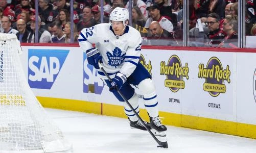 Apr 26, 2025; Ottawa, Ontario, CAN; Toronto Maple Leafs defenseman Jake McCabe (22) skates with the puck in game four of the first round of the 2025 Stanley Cup Playoffs against the Ottawa Senators at the Canadian Tire Centre Apr 26, 2025; Ottawa, Ontario, CAN; Toronto Maple Leafs defenseman Jake McCabe (22) skates with the puck in game four of the first round of the 2025 Stanley Cup Playoffs against the Ottawa Senators at the Canadian Tire Centre