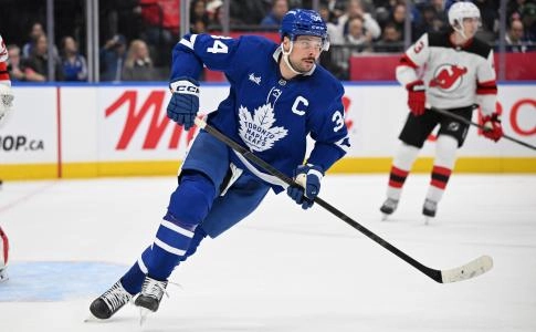 Jan 16, 2025; Toronto, Ontario, CAN; Toronto Maple Leafs forward Auston Matthews (34) pursues the play against the New Jersey Devils in the first period at Scotiabank Arena. Mandatory Credit: Dan Hamilton-Imagn Images