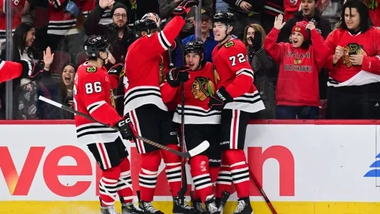 Chicago Blackhawks' Frank Nazar celebrates a goal with his teammates