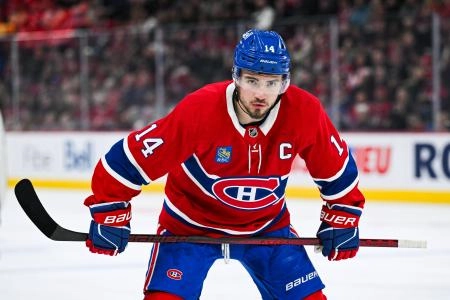 Apr 16, 2025; Montreal, Quebec, CAN; Montreal Canadiens center Nick Suzuki (14) looks on against the Carolina Hurricanes in the first period at Bell Centre. Mandatory Credit: David Kirouac-Imagn Images
