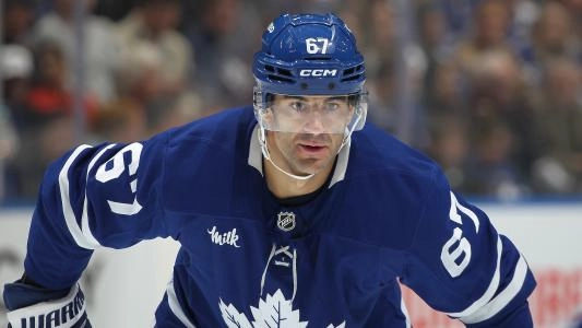 Leafs' Max Pacioretty gets set to take a face-off during a home game