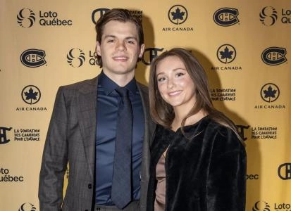 Photo of Montreal Canadiens forward Jake Evans and his wife Emily Flat
