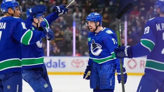 Vancouver Canucks forward Filip Chytil celebrating a goal.