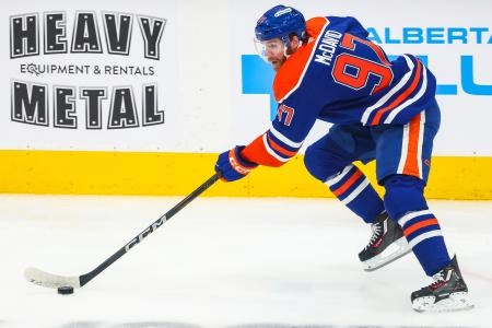 Jun 14, 2025; Edmonton, Alberta, CAN; Edmonton Oilers center Connor McDavid (97) skates with the puck against the Florida Panthers during the first period in game five of the 2025 Stanley Cup Final at Rogers Place