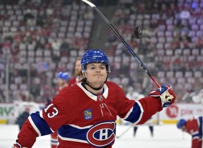 Apr 25, 2025; Montreal, Quebec, CAN; Montreal Canadiens forward Cole Caufield (13) looks to bat a puck in midair during the warmup period in game three of the first round of the 2025 Stanley Cup Playoffs against the Washington Capitals at the Bell Centre. Mandatory Credit: Eric Bolte-Imagn Images Apr 25, 2025; Montreal, Quebec, CAN; Montreal Canadiens forward Cole Caufield (13) looks to bat a puck in midair during the warmup period in game three of the first round of the 2025 Stanley Cup Playoffs against the Washington Capitals at the Bell Centre. Mandatory Credit: Eric Bolte-Imagn Images