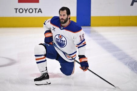 May 21, 2025; Dallas, Texas, USA; Edmonton Oilers center Adam Henrique (19) practices before game one of the Western Conference Final of the 2025 Stanley Cup Playoffs at American Airlines Center. Mandatory Credit: Jerome Miron-Imagn Images