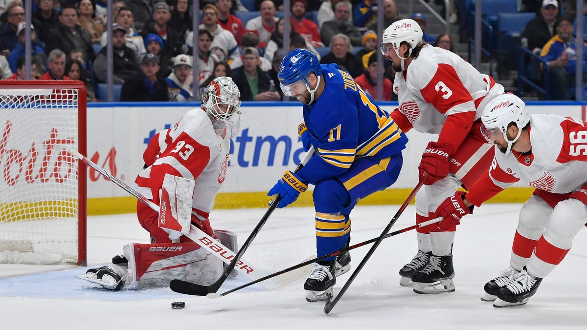 Wings goalie Cossa wins NHL debut in shootout vs. Sabres