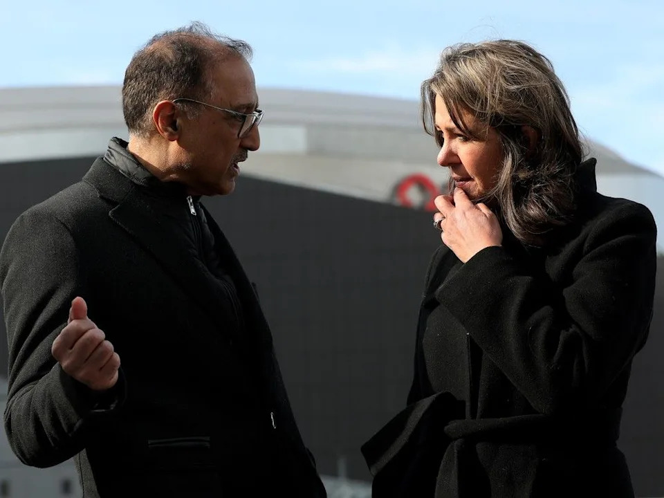 Mayor Amarjeet Sohi and Premier Danielle Smith chat in March following a press conference to officially announce a funding agreement for a new $250-million OEG event park.