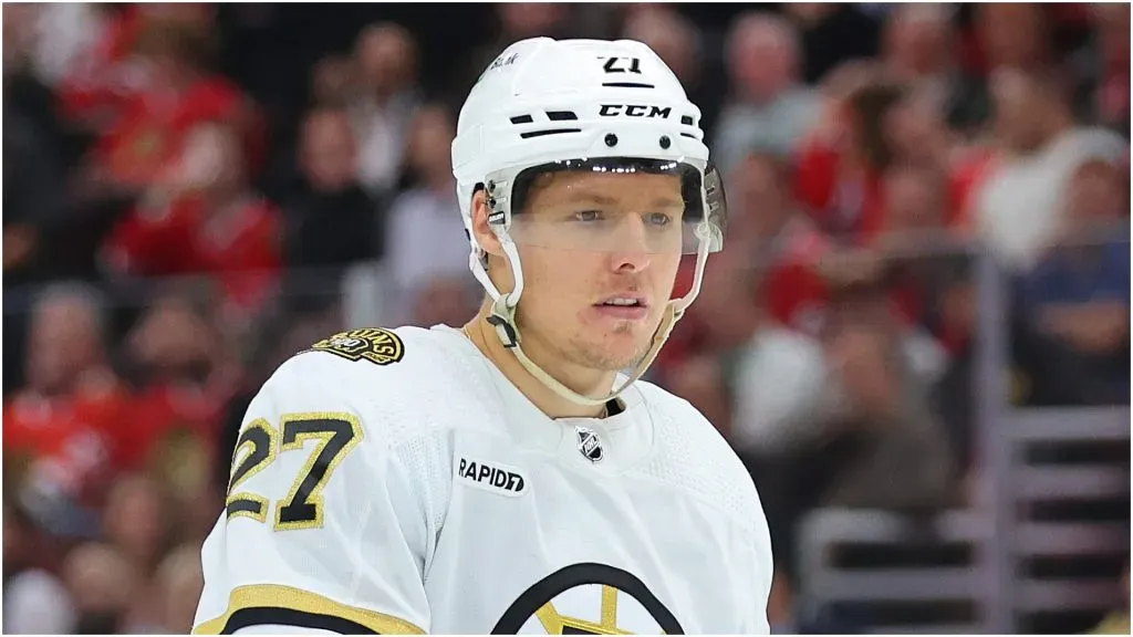 Hampus Lindholm #27 of the Boston Bruins looks on against the Chicago Blackhawks during the first period at the United Center on October 24, 2023 in Chicago, Illinois.