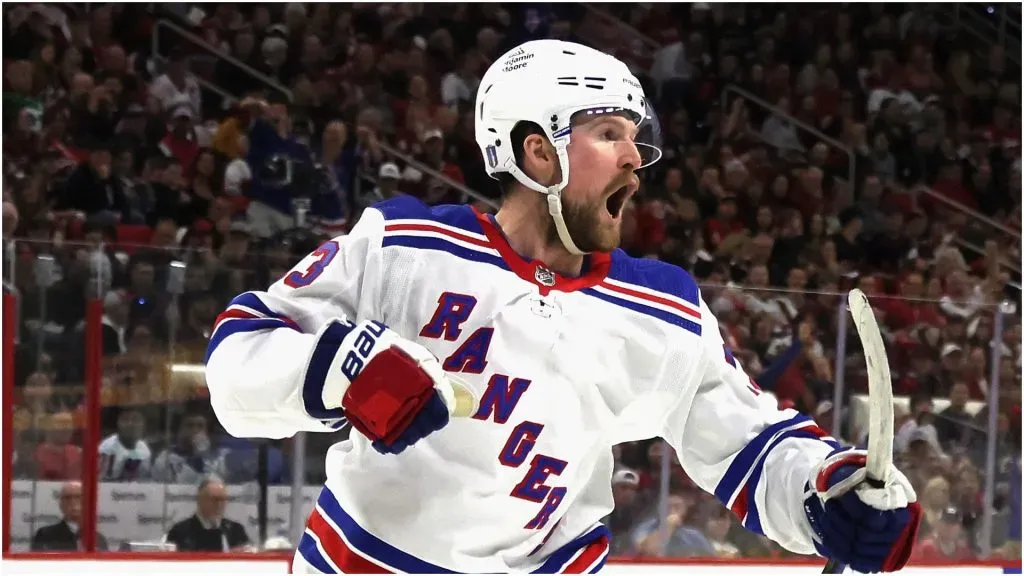 Alexis Lafreniere celebrates a goal against the Carolina Hurricanes at PNC Arena.