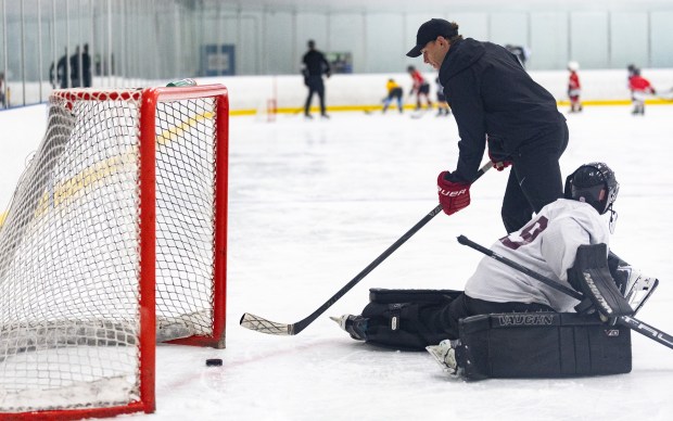 Former Blackhawks right wing Patrick Kane scores a goal on a youth goalie during Patrick Kane Day Friday, Aug. 8, 2025 at Johnny's Ice House West in the United Center neighborhood of Chicago. The City of Chicago officially named Aug. 8 Patrick Kane Day. Kane donated multiple items to the youth that attended the skate around including hockey sticks, helmets, gloves and more.(Dominic Di Palermo/Chicago Tribune)