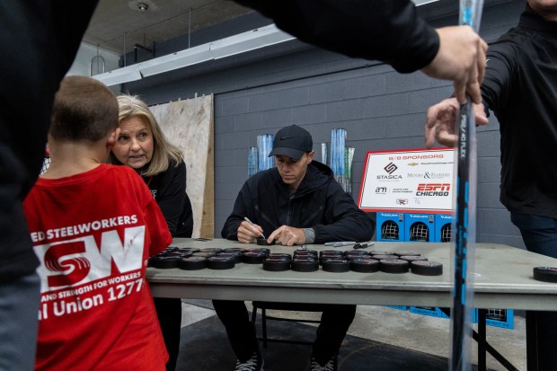 Former Blackhawks right winger Patrick Kane signs autographs for youth hockey players during Patrick Kane Day Friday, Aug. 8, 2025 at Johnny's Ice House West in the United Center neighborhood of Chicago. The City of Chicago officially named Aug. 8 Patrick Kane Day. Kane donated multiple items to the youth that attended the skate around including hockey sticks, helmets, gloves and more.(Dominic Di Palermo/Chicago Tribune)