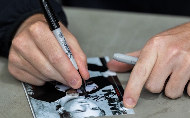 Former Blackhawks right wing Patrick Kane signs autographs for youth hockey players during Patrick Kane Day Friday, Aug. 8, 2025 at Johnny's Ice House West in the United Center neighborhood of Chicago. The City of Chicago officially named Aug. 8 Patrick Kane Day. Kane donated multiple items to the youth that attended the skate around including hockey sticks, helmets, gloves and more.(Dominic Di Palermo/Chicago Tribune)
