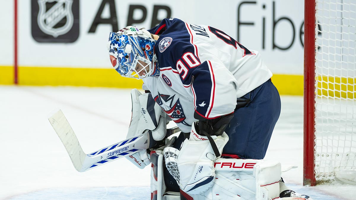Columbus Blue Jackets goalie Elvis Merzlikins (90) stretches in the second period against the Ottawa Senators at the Canadian Tire Centre. 
