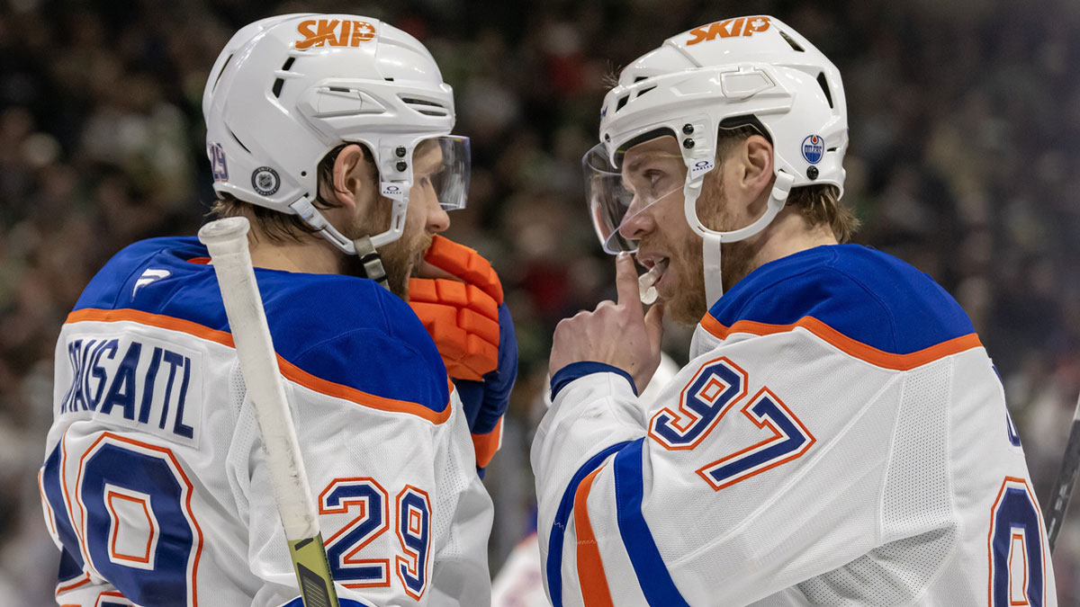Edmonton Oilers forward Leon Draisaitl (29) and forward Connor McDavid (97) talk before a face-off against the Minnesota Wild during the third period at Xcel Energy Center.