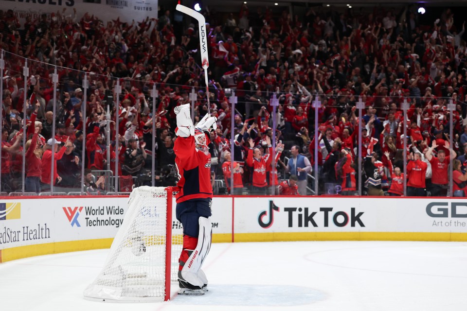 WASHINGTON, DC - APRIL 30: Logan Thompson #48 of the Washington Capitals celebrates after the empty net goal scored against the Montreal Canadiens by teammate Brandon Duhaime #22 during the third period in Game Five of the First Round of the 2025 Stanley Cup Playoffs at Capital One Arena on April 30, 2025 in Washington, DC. (Photo by Scott Taetsch/Getty Images)
