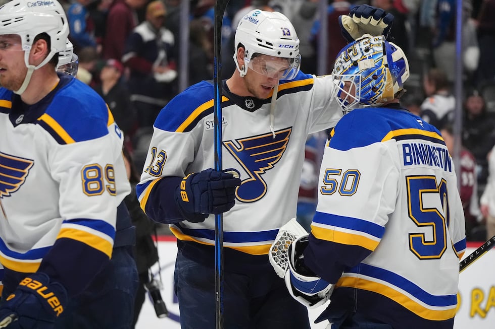 St. Louis Blues right wing Alexey Toropchenko, left, congratulates goaltender Jordan...