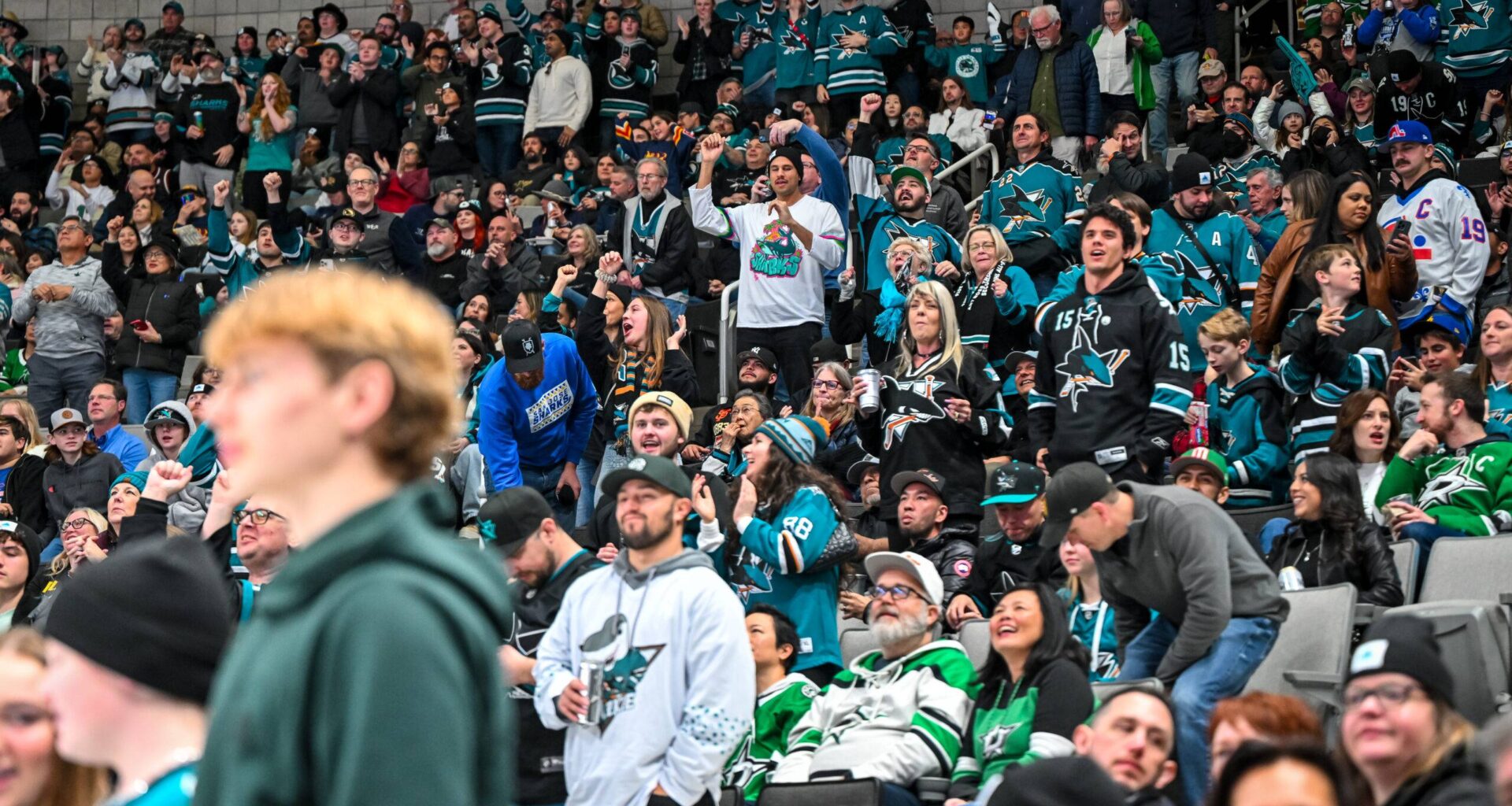 Fans cheer on the San Jose Sharks at the SAP Center.