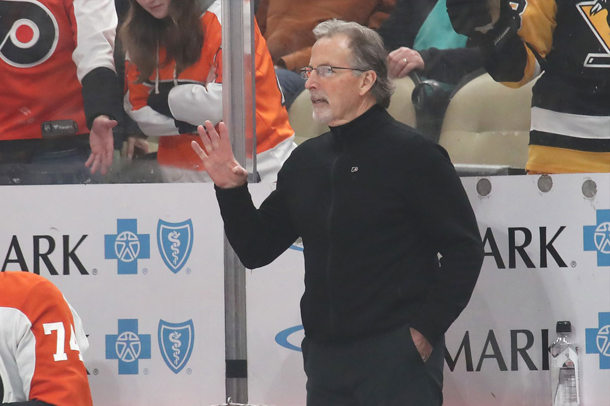 Philadelphia Flyers head coach John Tortorella reacts on the bench against the Pittsburgh Penguins during the second period at PPG Paints Arena.