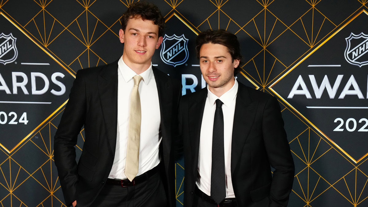 Luke and Quinn Hughes appear on a red carpet before the start of the 2024 NHL Awards at Fontainebleau Las Vegas.