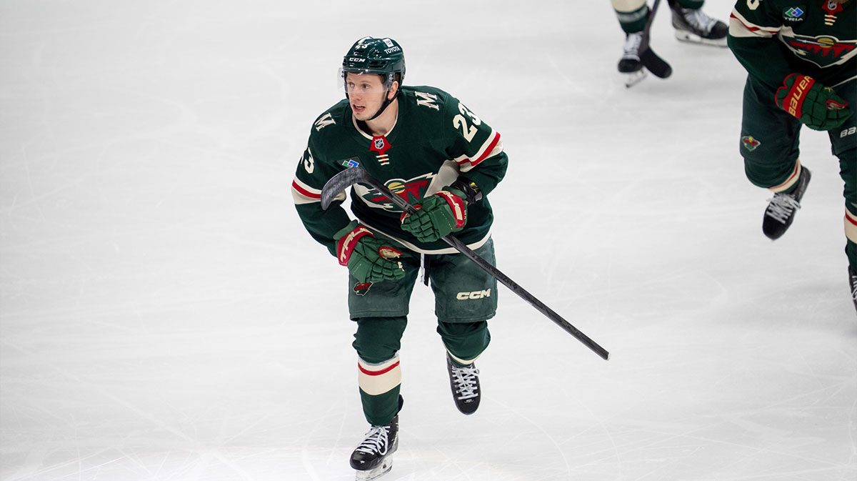 Minnesota Wild center Marco Rossi (23) leads the team to the bench after scoring against the Vegas Golden Knights in the first period in game three of the first round of the 2025 Stanley Cup Playoffs at Xcel Energy Center.