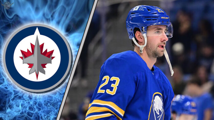 An image of Mattias Samuelsson in his Buffalo Sabres jersey, looking focused during a game, with the Winnipeg Jets logo in the background.
