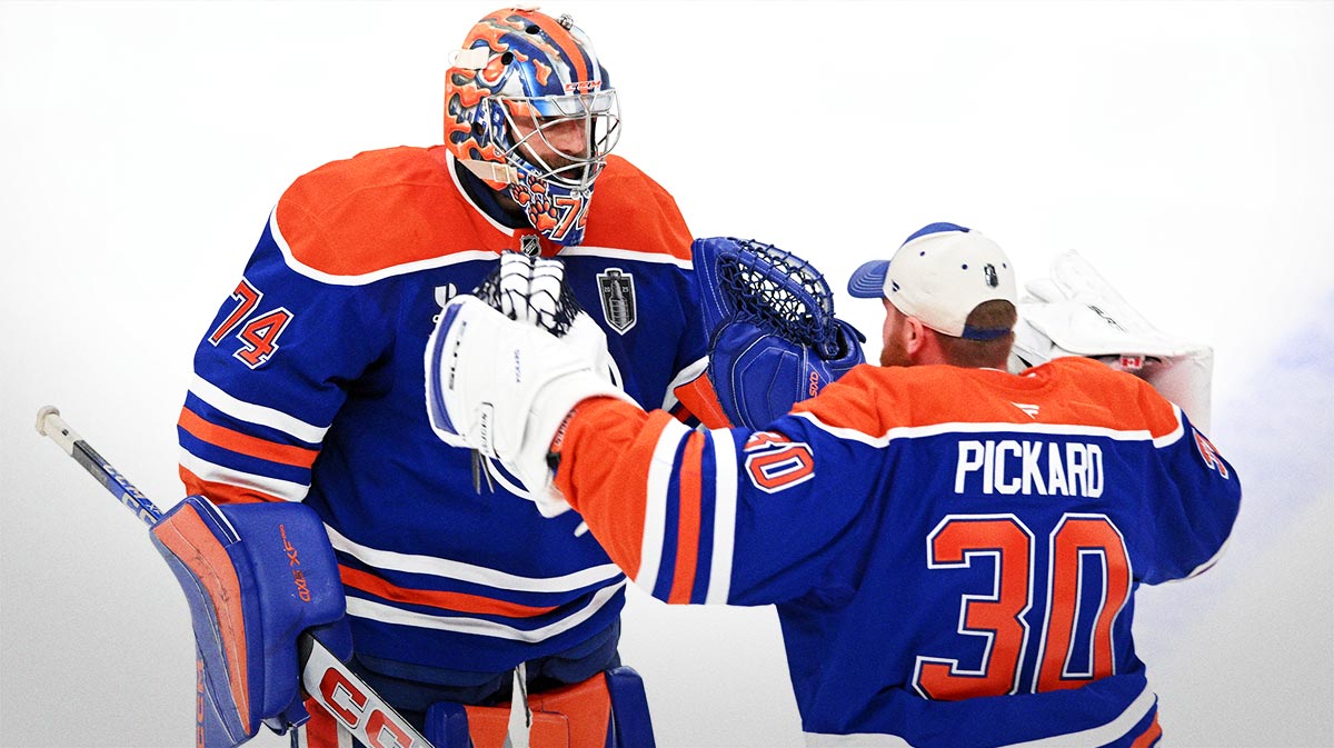 Edmonton Oilers goaltender Stuart Skinner (74) reacts with goaltender Calvin Pickard (30) after defeating the Florida Panthers in overtime for game one of the 2025 Stanley Cup Final at Rogers Place.