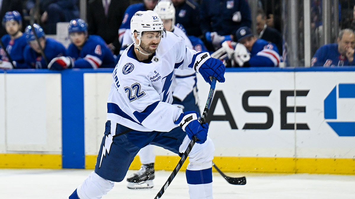Apr 7, 2025; New York, New York, USA; Tampa Bay Lightning right wing Oliver Bjorkstrand (22) attempts a shot against the New York Rangers during the third period at Madison Square Garden. 