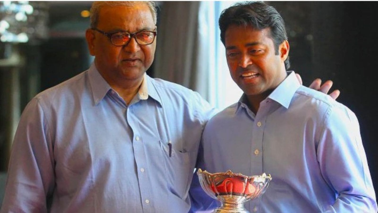 Dr Vece Paes with his son Leander Paes as the tennis ace celebrates his 15th Grand Slam title at a Mumbai hotel. (Express Photo by Ganesh Shirsekar)